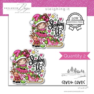 May include: Two identical stickers featuring a cartoon elf with brown hair, wearing a green and pink outfit, holding a lollipop next to a reindeer and a pink sleigh. The text "Sleighing It" is written in black script. The design includes pink hearts, yellow stars, and green snowflakes on a white background.