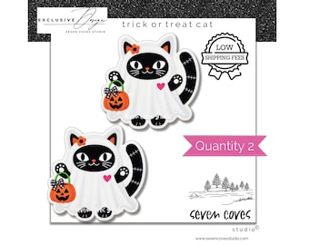 May include: Two identical stickers featuring a black and white cat wearing a white ghost costume. The cat has a small orange flower on its head, a pink heart on its chest, and holds an orange jack-o'-lantern bucket with a black and white bow.