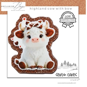 May include: A cute, white highland cow with brown ears and a matching bow, sitting on a glittery brown background. The image includes the text "highland cow with bow" and the logo for Seven Coves Studio.