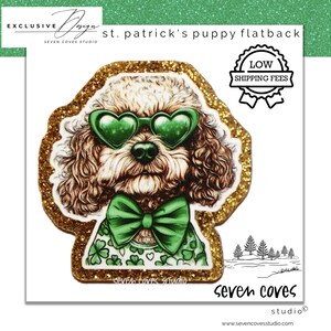 May include: A gold glitter sticker featuring a cartoon illustration of a brown and white dog wearing green shamrock-patterned clothing and green heart-shaped sunglasses. The sticker says "st. patrick's puppy flatback" and "seven coves studio".