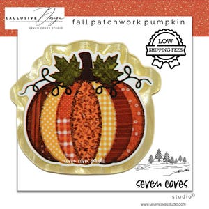 May include: A decorative sticker featuring a fall patchwork pumpkin with vertical segments in orange, yellow, and brown patterns. The pumpkin has two green leaves and black curly vines at the top. Text includes "fall patchwork pumpkin" and "seven coves studio".