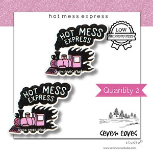 May include: Two stickers with a pink train design and the text "HOT MESS EXPRESS" in black. The stickers are on a white background with the text "Quantity 2" in a pink banner. The image also includes the text "seven coves studio".