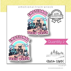May include: Two stickers with the text "Emotional Train Wreck" and a cartoon skeleton, train, and raccoon design. The stickers are white with a pink, blue, and purple rainbow background. One sticker has a "Low Shipping Fees" badge.