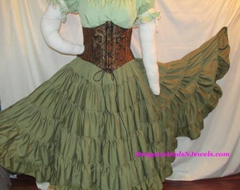 May include: A green, multi-layered, ruffled skirt with a brown corset belt. The skirt is made of a soft, flowing fabric and has a long, flowing silhouette.