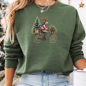 Christmas Reindeer on Bicycle Graphic Women&#39;s Sweatshirt, Soft Printed Decorative X-Mas Unisex Shirt, Cozy Men&#39;s Christmas Top