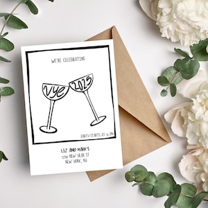May include: A black and white illustration of two champagne glasses clinking together. The glasses say "Vye" and "2025". The text "WE'RE CELEBRATING" is at the top of the card. The text "PARTY STARTS AT 8 PM" is below the glasses. The text "LIZ AND MARK'S" is at the bottom of the card, followed by an address.