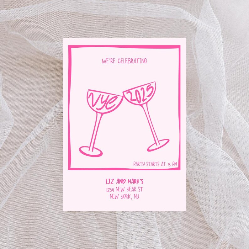 May include: Pink and white New Year's Eve party invitation with a graphic of two champagne glasses clinking. The text reads "We're celebrating" and "Vye 2025". The party starts at 8 PM. The invitation is for Liz and Mark's at 1234 New Year St, New York, NY.
