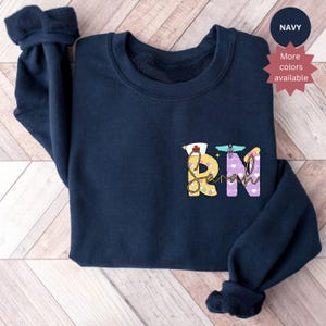 Custom Registered Nurse Sweatshirt With Name Personalized RN Pocket Sweatshirt Nurse Life Outfit Nurse Appreciation Clothing Cute Nurse Gift