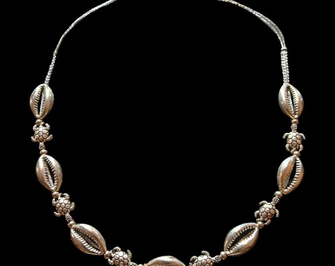 Cowrie and sea turtle, stainless steel choker