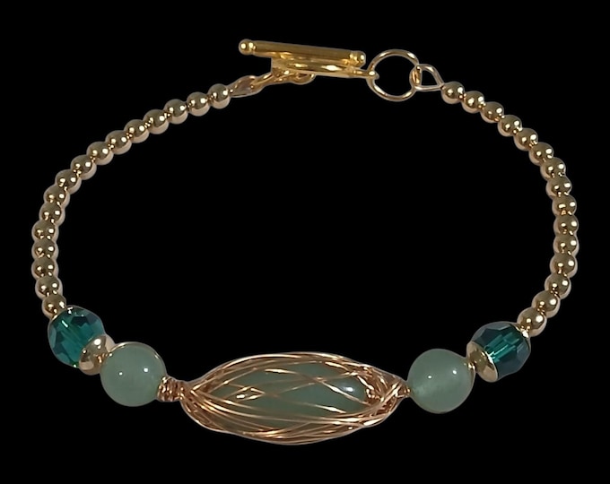 Green aventurine and gold bangle bracelet.