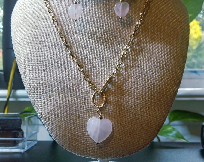 Rose quartz heart necklace and earrings set.