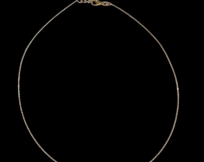 Diamond cut wire choker.