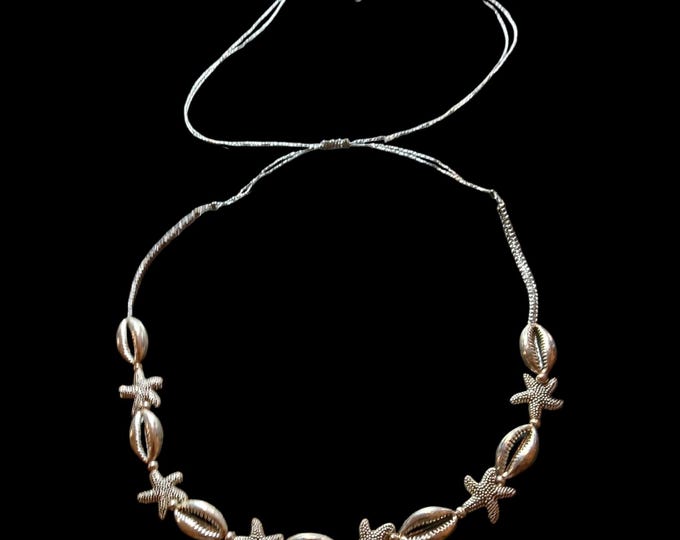 Cowrie and star fish stainless steel adjustable choker.