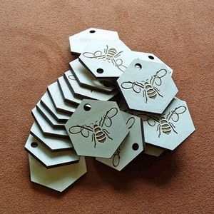 100 wood engraved hang tags custom cut any shape. image 3