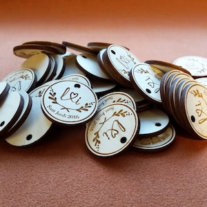 100 wood engraved hang tags custom cut any shape. image 1