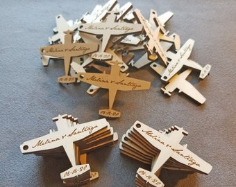 100 little wood engraved airplanes.