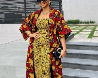 beaded ankara dresses Handmade Ankara Dress: Beaded Peplum Skirt & Blouse, Umoja Collection
