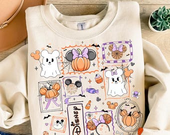 May include: Cream-colored sweatshirt with a Halloween-themed graphic. The design includes cartoon ghosts, pumpkins, spiderwebs, and Minnie Mouse ears. The word "Disney" is also visible. The text "Ready to press DTF Transfer" is at the top.