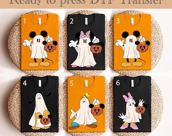 May include: Six t-shirts with Halloween-themed designs. Each shirt features a cartoon character dressed as a ghost, holding a jack-o'-lantern. The shirts are orange and black, with the text "Ready to press DTF Transfer" at the top.