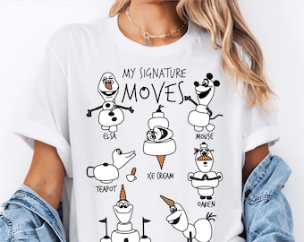 Puede incluir: Camiseta blanca con un gráfico de dibujos animados en blanco y negro. El gráfico incluye el texto "MY SIGNATURE MOVES" e ilustraciones de personajes etiquetados como "ELSA", "MOUSE", "ICE CREAM", "TEAPOT", "OAKEN", "CASTLE" y "UNICORN". La parte superior dice "Ready to press DTF Transfer".