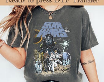 May include: Dark grey t-shirt with a Star Wars graphic. The design features Darth Vader, the Star Wars logo, and other characters. The text "Ready to press DTF Transfer" is at the top of the image.
