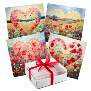May include: Four heart-shaped art prints with colorful floral landscapes, including red poppies, are displayed. A white gift box with a clear lid and a red ribbon is in the foreground. The art has a mosaic-like appearance.