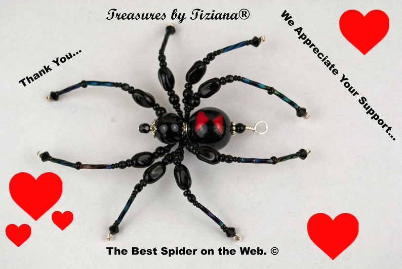 May include: Black beaded spider with red hourglass markings on its abdomen. The spider is surrounded by red hearts and the text "Thank You... Treasures by TizianaⓇ We Appreciate Your Support... The Best Spider on the Web.Ⓡ"