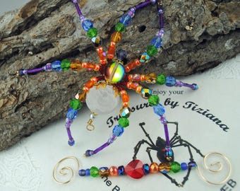 Perlenbesetzter Weihnachtsanhänger Regenbogen Spinne mit Tinsel Legende