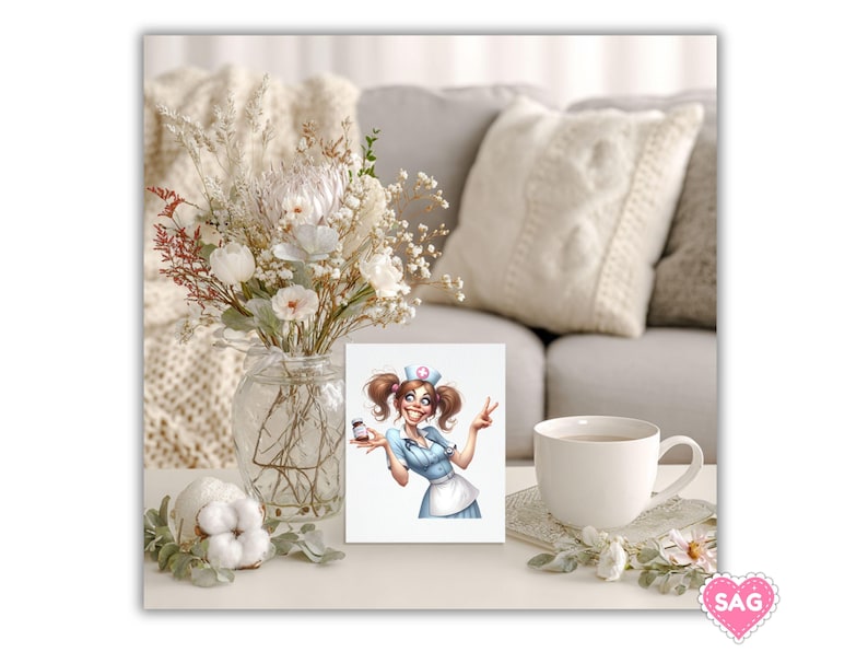May include: A greeting card featuring a cartoon nurse in a blue uniform holding a medicine bottle and making a peace sign. The card is on a white table with a cup of tea, flowers, and a decorative heart.