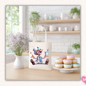 May include: A cream-colored tote bag featuring a cartoon doctor with a red nose, glasses, and a blue cross on his hat. The doctor is holding dental tools and a small container. A stack of donuts with pastel frosting sits on a white plate.