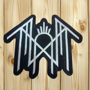 May include: A black and white embroidered patch with an eagle design. The patch features a black background with white geometric lines and a central emblem. The patch is designed to be sewn onto clothing or accessories.