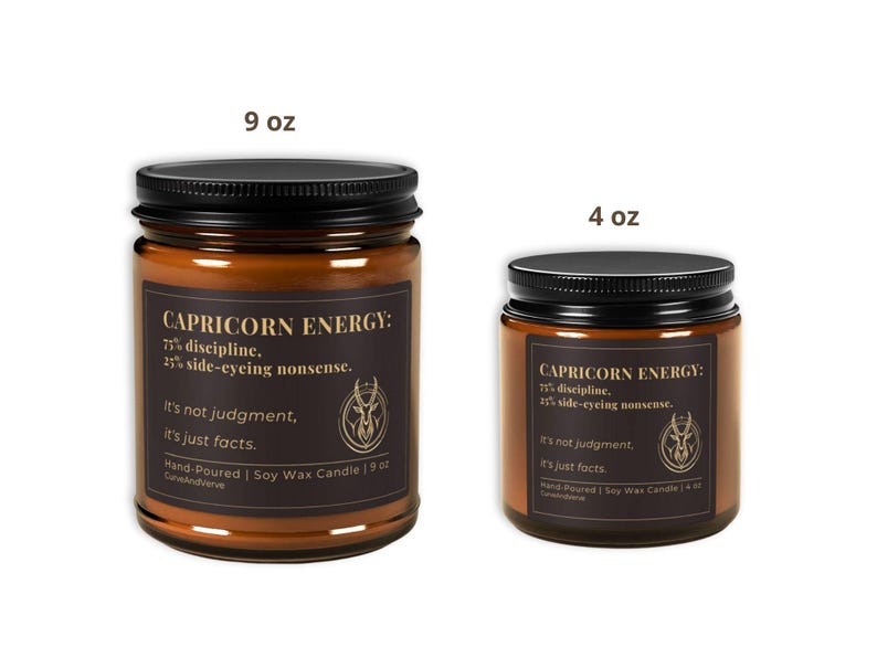 Side-by-side view of 9 oz and 4 oz Capricorn Energy Candles, highlighting the size difference and the detailed zodiac-themed label.