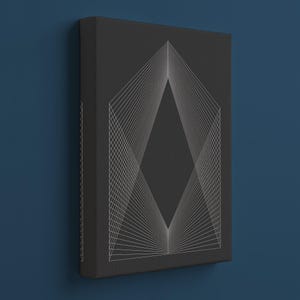May include: A dark gray canvas art piece featuring a geometric design. The artwork showcases a white, diamond-shaped pattern created with intersecting lines. The canvas is mounted on a dark gray frame, creating a modern aesthetic.