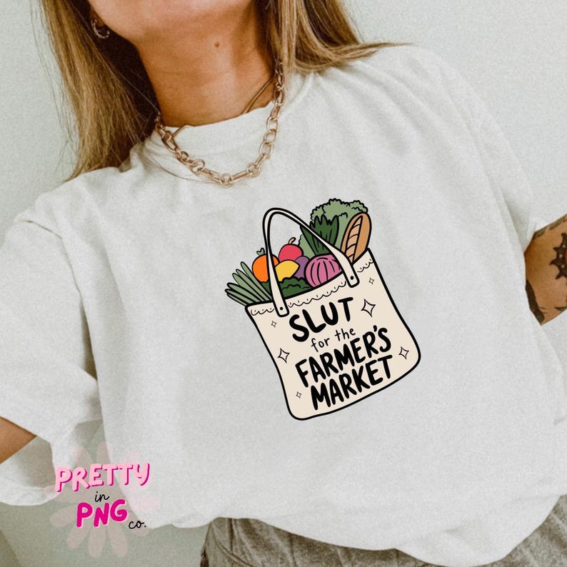 May include: White t-shirt featuring a graphic of a shopping bag filled with fruit and vegetables, with the text "Slut for the Farmer's Market".