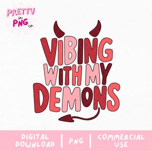 May include: Red and pink graphic text with devil horns and a tail that reads "VIBING WITH MY DEMONS".