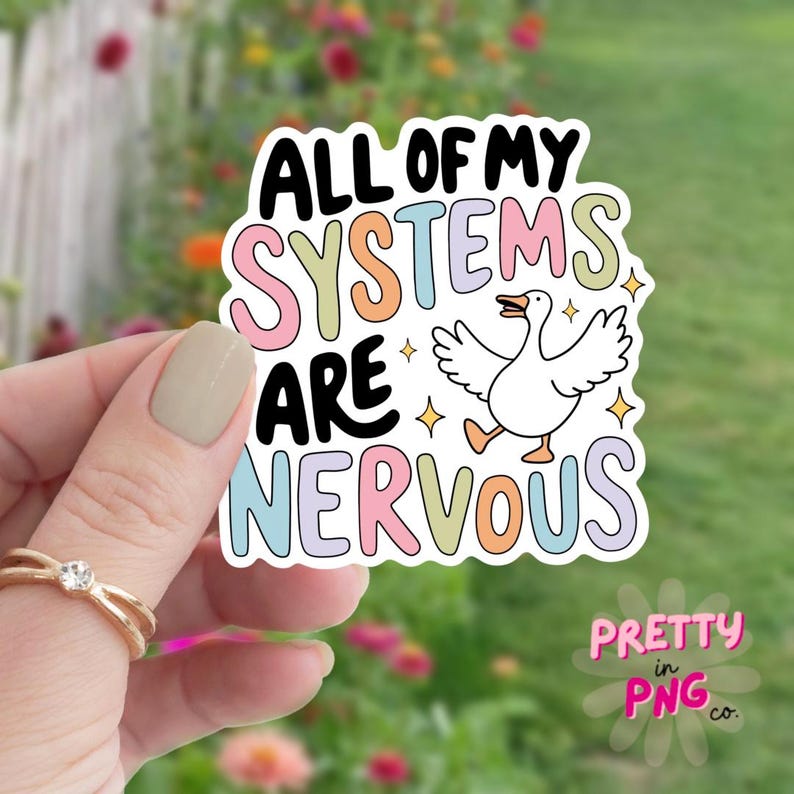 Puede incluir: Una pegatina con un ganso blanco con pico y patas rosas, y el texto "All of my systems are nervous" en colores arco&iacute;ris.