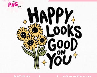 以下が含まれることがあります： 黒と黄色のひまわりグラフィックで、「Happy Looks Good On You」というテキストが書かれています。