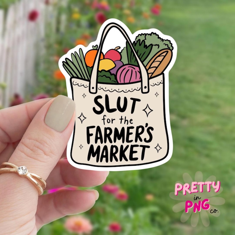 May include: A white tote bag with a colourful illustration of produce and the text "Slut for the Farmer's Market".