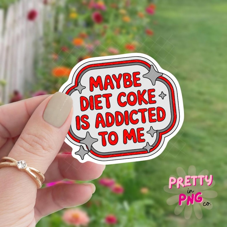 May include: A white sticker with a red and gray border, featuring the text "MAYBE DIET COKE IS ADDICTED TO ME" in red. The sticker has a unique shape with star accents and the words "Pretty in PNG co." in pink.