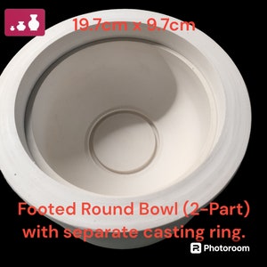 May include: A white ceramic mould for a footed round bowl. The mould is 19.7 cm in diameter and 9.7 cm in height. The mould is in two parts, with a separate casting ring.