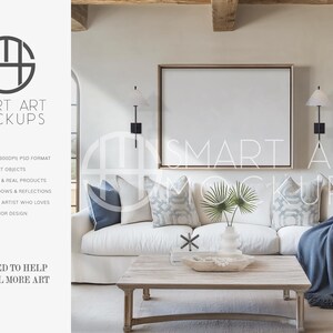 Neutral Coastal Living Room Mockup: An airy beach-inspired room with a white linen sofa and rustic wooden table. Blue accents add a seaside feel, a wood blank canvas frame is perfect for inserting coastal, ocean inspired or abstract artwork.