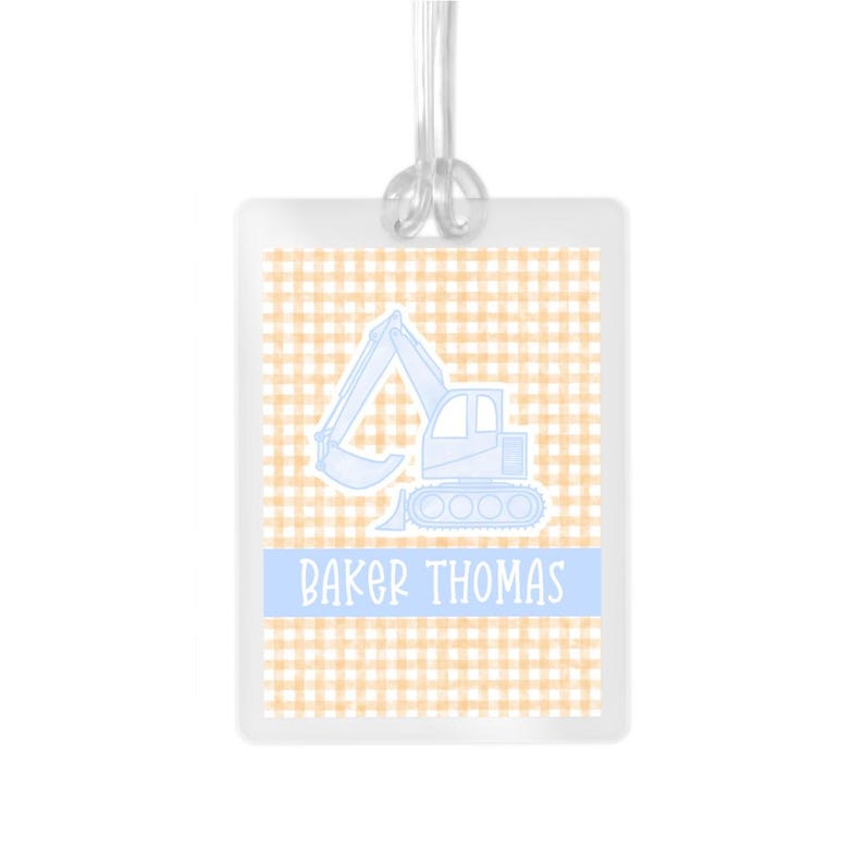 May include: A light blue excavator with a yellow and white gingham background. The text "Baker Thomas" is printed in blue on a white banner.
