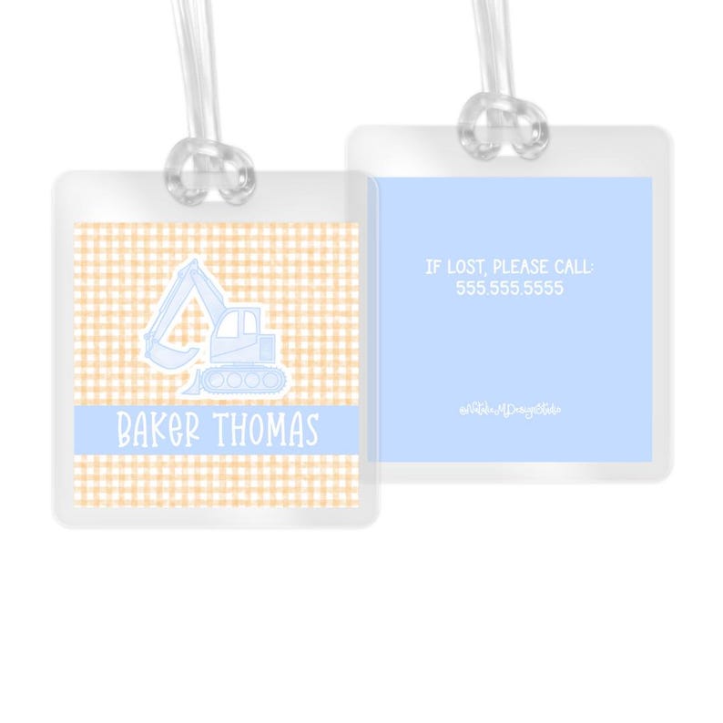 May include: A blue and white luggage tag with a gingham pattern and a blue excavator illustration. The tag has the text "Baker Thomas" and "IF LOST, PLEASE CALL: 555.555.5555".