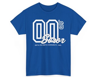 May include: Royal blue t-shirt with white text. The design features the numbers "00" in a block font, the word "Soror" in a script font, and the text "ZETA PHI BETA SORORITY, INC."