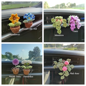 May include: A selection of crocheted car air fresheners shaped like flowers. The flowers include a sunflower, forget-me-nots, monstera, violet, purple daisy, dandelion, and pink rose. Each flower is in a small brown pot. The text "Soft Serenity" is visible.