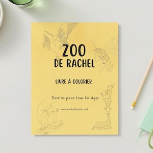 May include: A yellow coloring book with the title "Zoo de Rachel" and the text "Livre à colorier" in black. The book features drawings of a bird, a bee, a cat, and a giraffe. The text "Dessins pour tous les âges" and the website "www.rachelboutin.art" are also included.