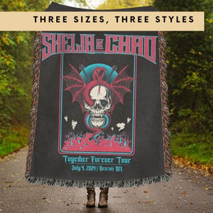 May include: Black woven throw blanket with a skull and wings design. The text "SHELIR & CHAD Together Forever Tour July 4, 2004 | Detroit MI" is printed on the blanket.