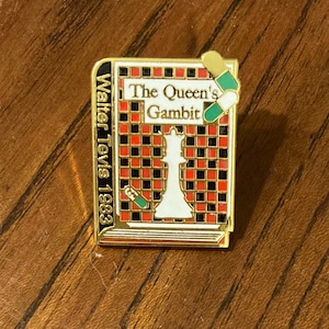 queen’s gambit pin