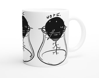 Nope - avocado seed in water ceramic Mug 11oz with black illustration on white ceramic