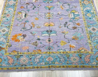 12054 – Handmade Oushak Rug 8x10 ft, Wool Area Rug in Lavender Purple with Aqua Blue Border & Multicolor Floral Accents